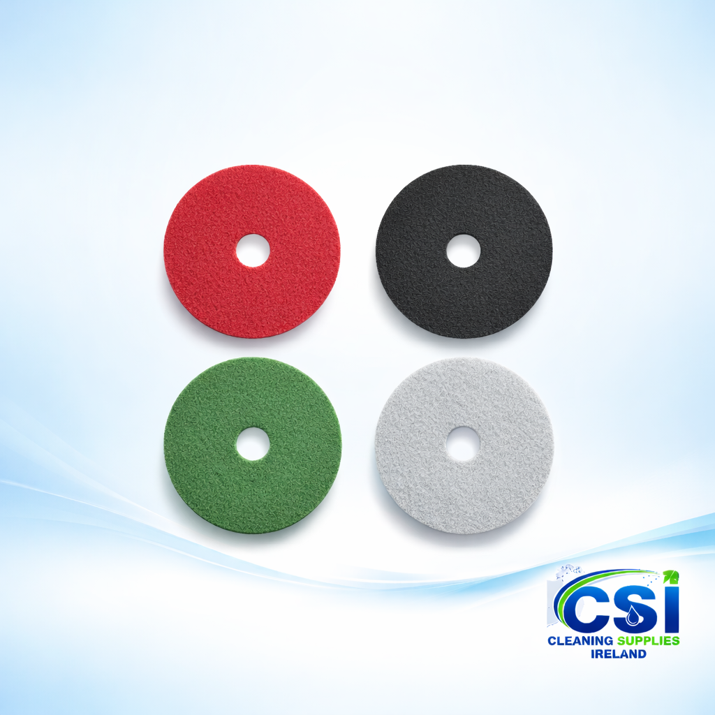 Assorted floor machine cleaning pads in black green red and white colours